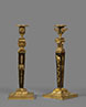 Pair of gilt and patinated bronze candlesticks with Egyptian busts 
Paris, Empire period, circa 1805-1810